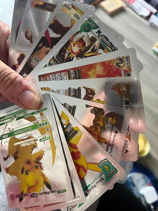  — Pack of ten new Pokemon cards read info