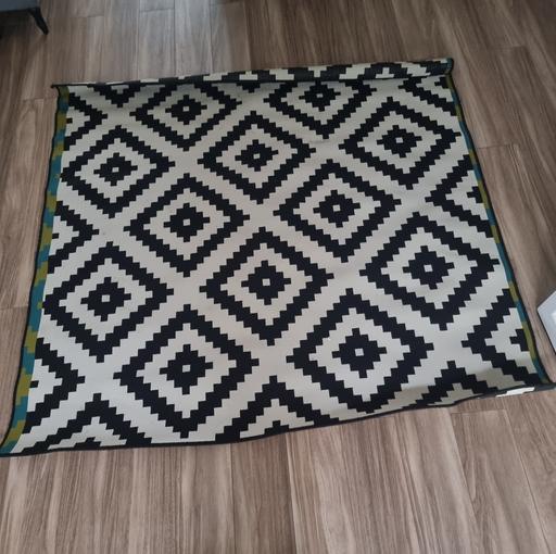  — Rug