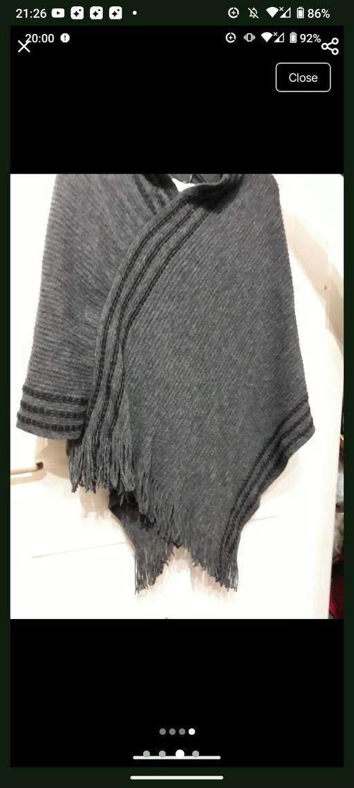  — women poncho size S/M