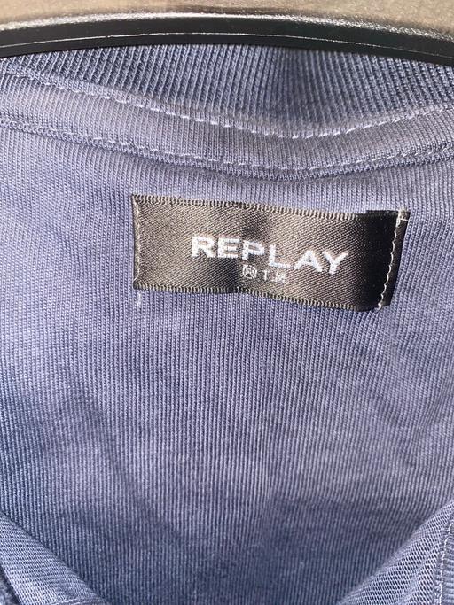  — Relay men’s blue polo shirt