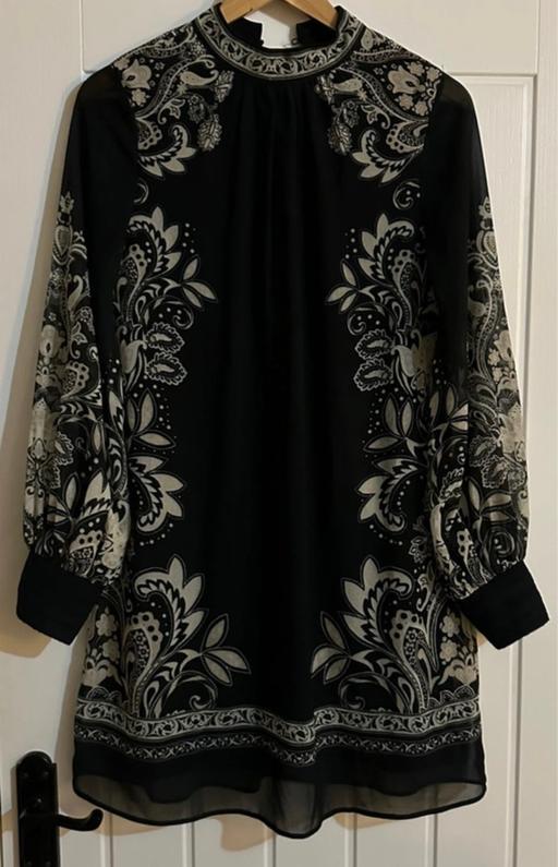  — Black dress