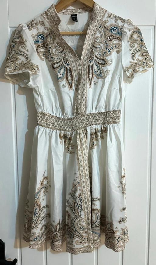  — Dress size small