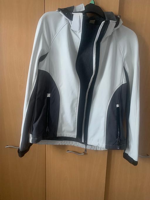  — Short waterproof jacket with hood and side po