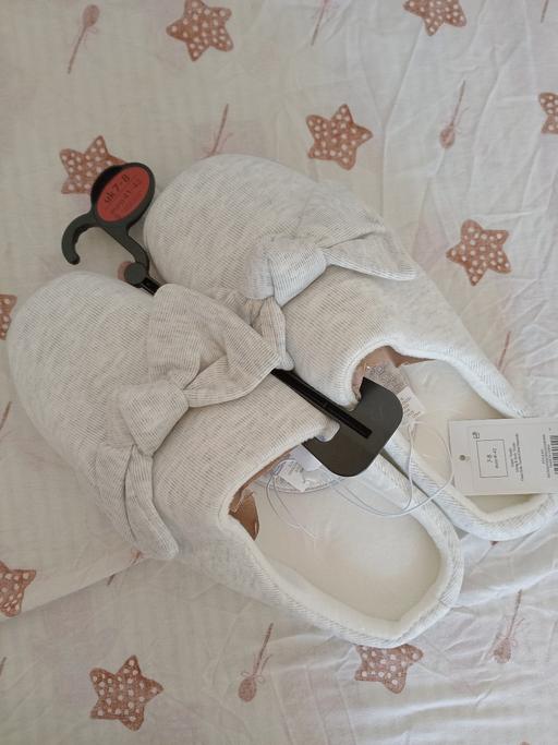  — slippers