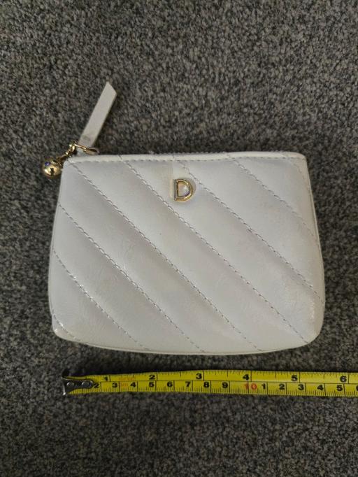  — Primark purse