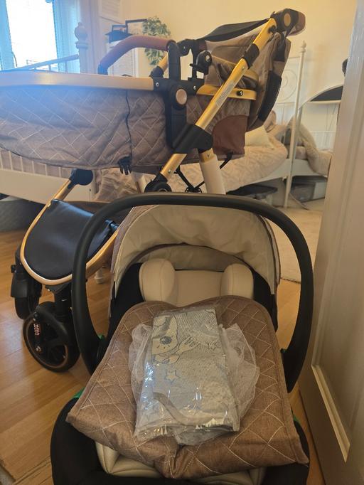  — brand new beige pram comes with car seat