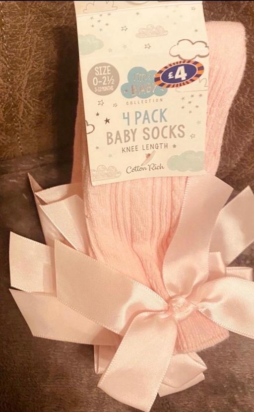  — Baby’s pink socks size 3-12 months