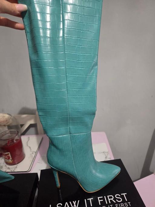  — teal  boots