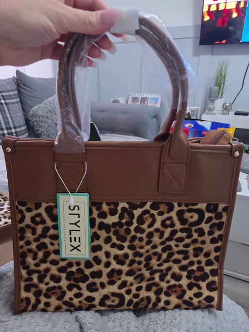 — handbag
