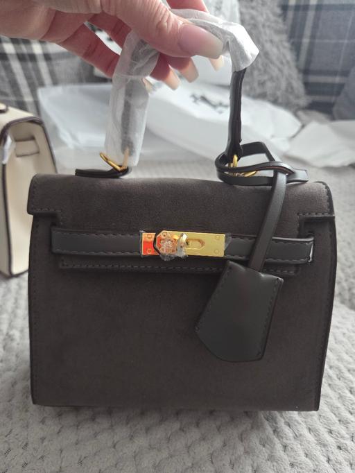  — handbag
