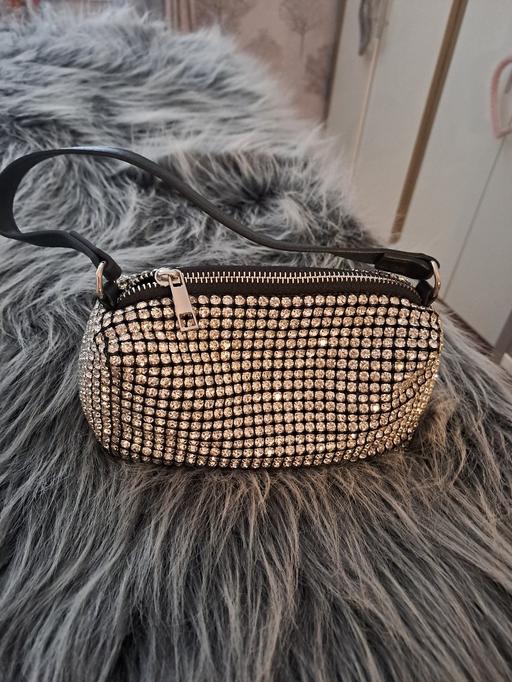  — new bag glizy from quiz
