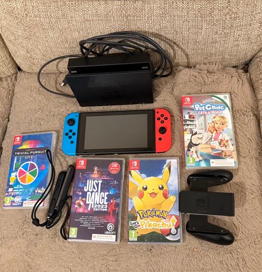  — Nintendo switch console neon with games