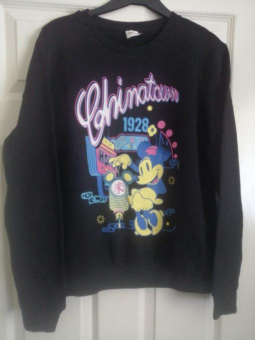  — Disney ladies medium sweatshirt as new