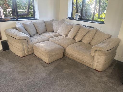  — DFS 8 seater L sofa and ith foot stool