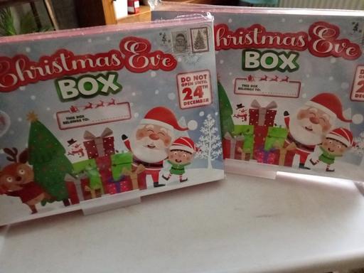  — 2 brand new Christmas eve boxes
