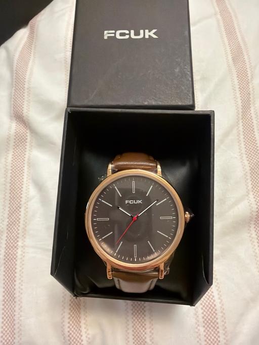  — Men’s FCUK watch