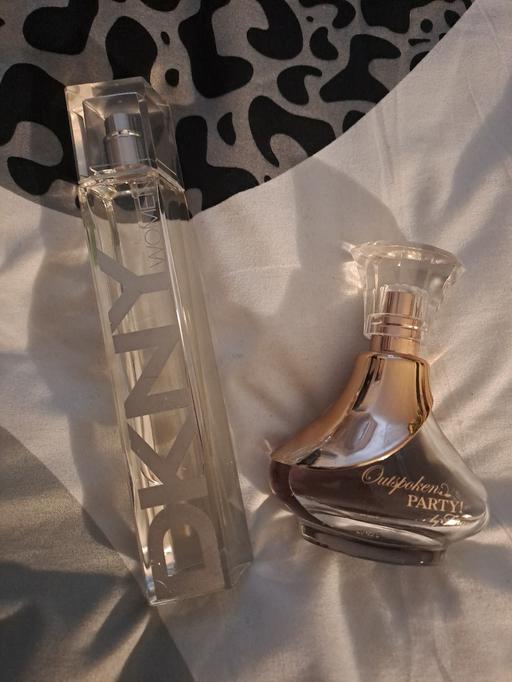  — 2 perfumes not full