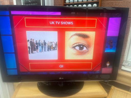  — LG 47” LCD Full HD TV on swivel stand.