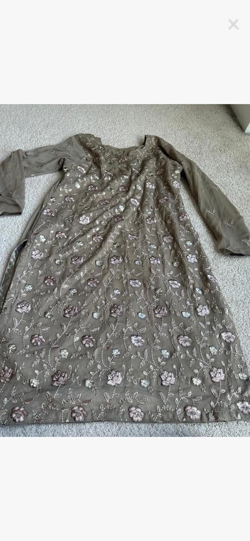  — Ladies Asian Suit