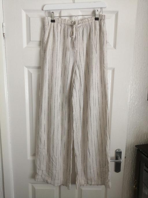  — H&M ladies small linen trousers