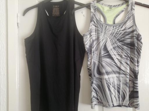  — As New two workout tops ladies