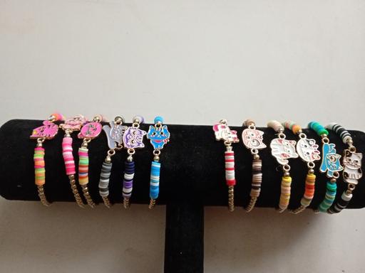  — new pack of 12 cats design bracelets