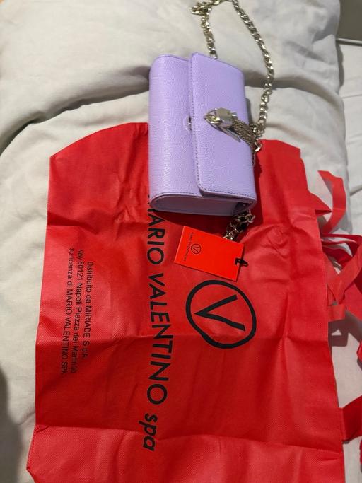  — pastel-purple Valentino Garavani crossbody,