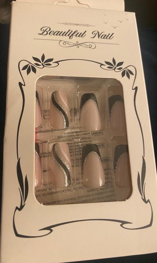  — False nails