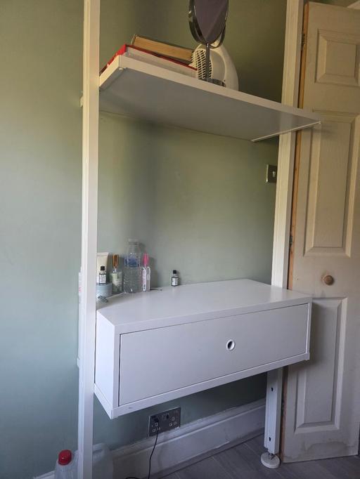 — shelving unit with desk