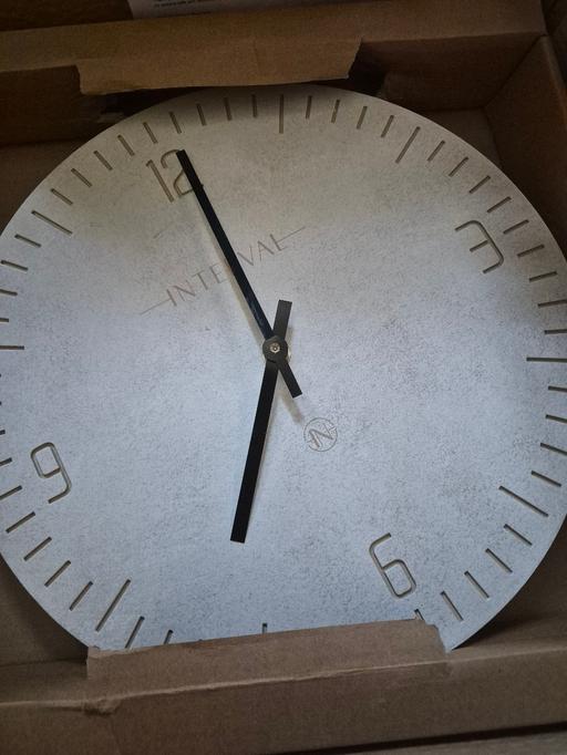  — Stone wall clock