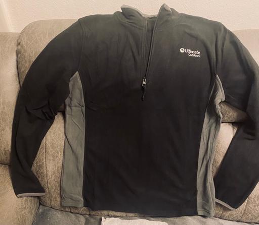  — Woman’s new fleece top size 16