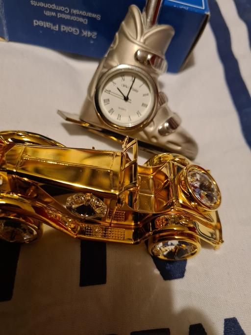  — clock and model car