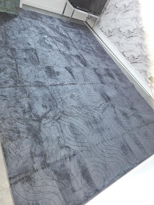  — rugs