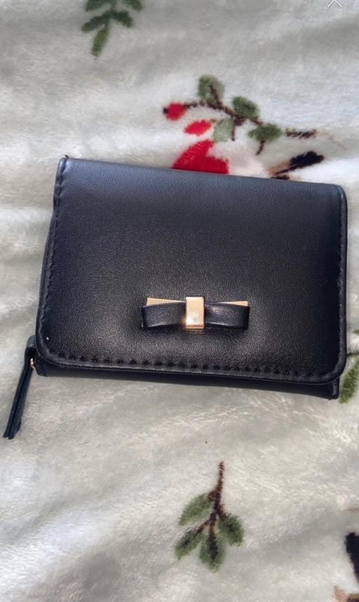  — Purse