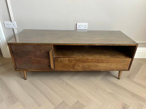  — Premium TV Unit