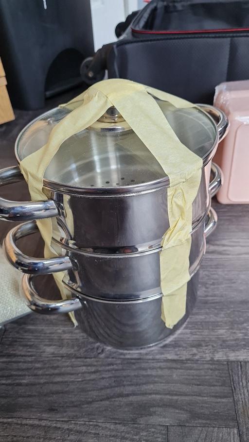  — steamer saucepans