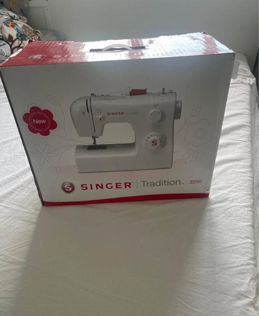  — singer sewing machine New
