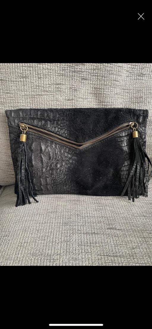  — Ladies black clutch bag