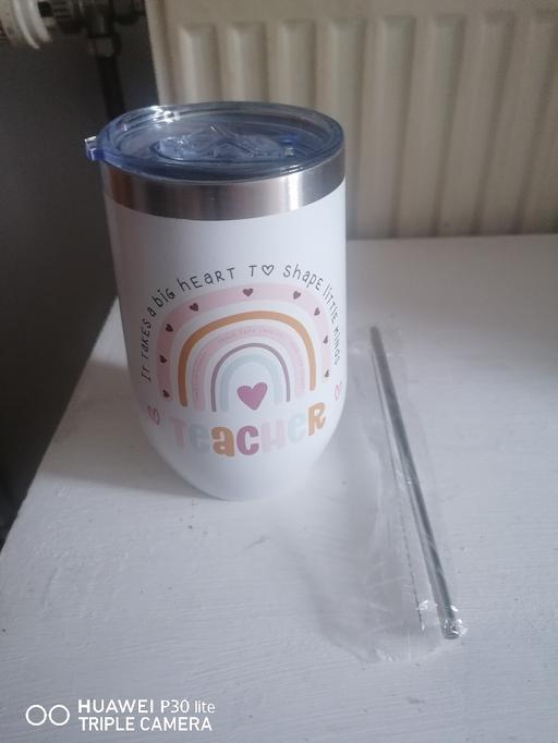 — travel cup