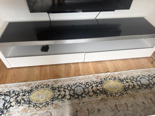  — Tv stand.  Dining table and 6 chairs and sofa
