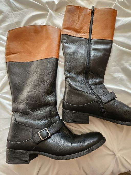  — Black and tan leather boots size 6.5