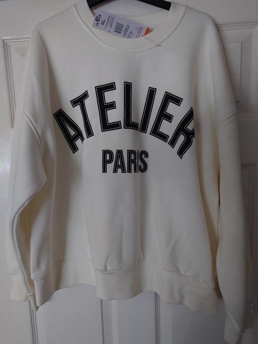 — Women's cream sweatshirt size 16-18