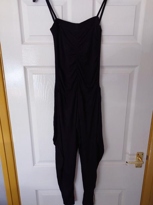  — Girls black jumpsuit size 11-12 years