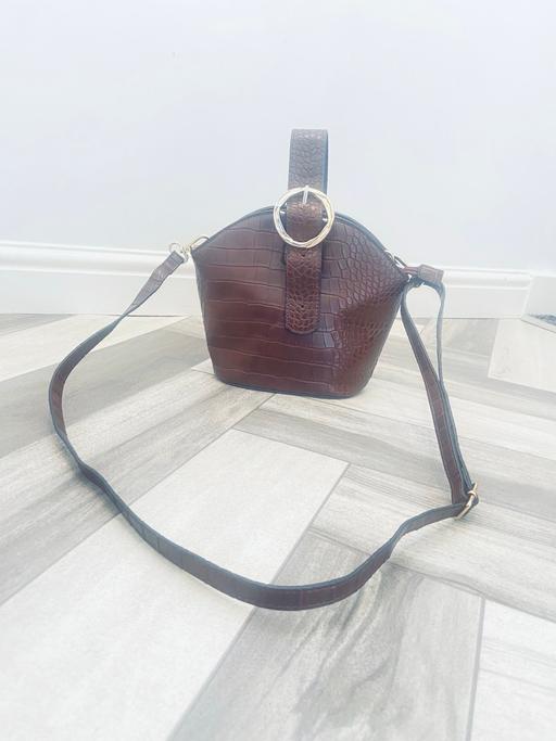  — F&F BAG