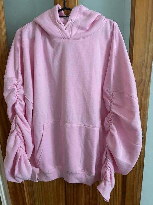  — Pink hoodie