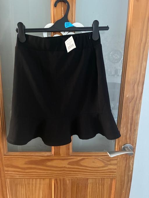  — Black skirt
