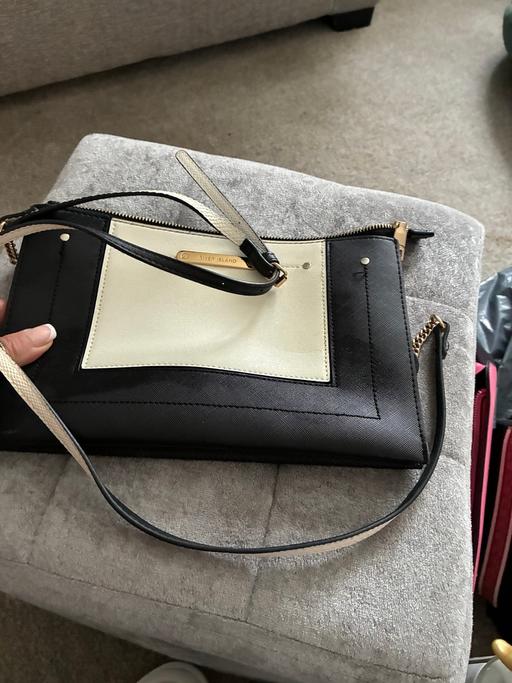  — Black river island bag