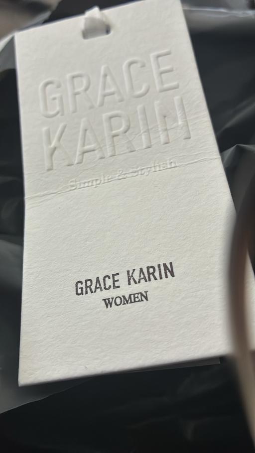  — Woman’s grace karin dress