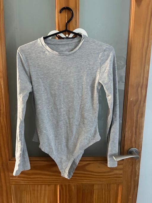  — Woman’s body suit