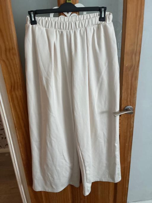  — Flared long jogging bottoms